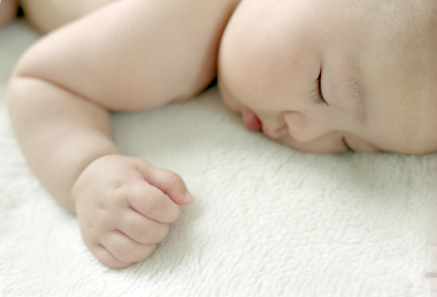 Baby sleeping Photograph by Gen Umekita