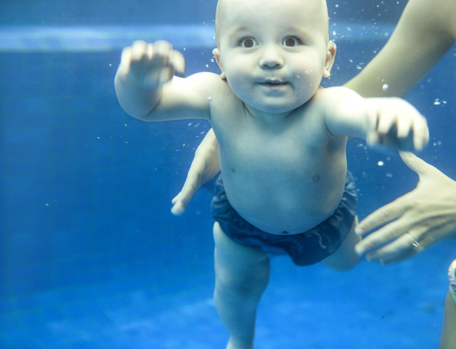 Baby underwater Photograph by Orbon Alija
