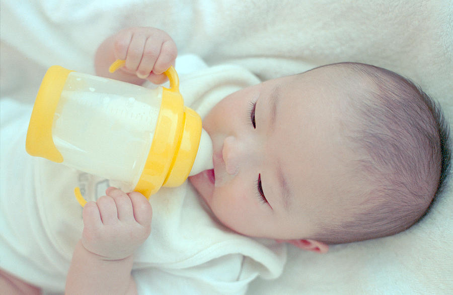 Baby who drinks milk Photograph by Gen Umekita