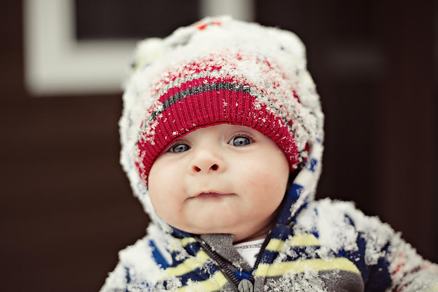 Baby With Blue Eyes Wearing A Hat Photograph by Robby Ryke