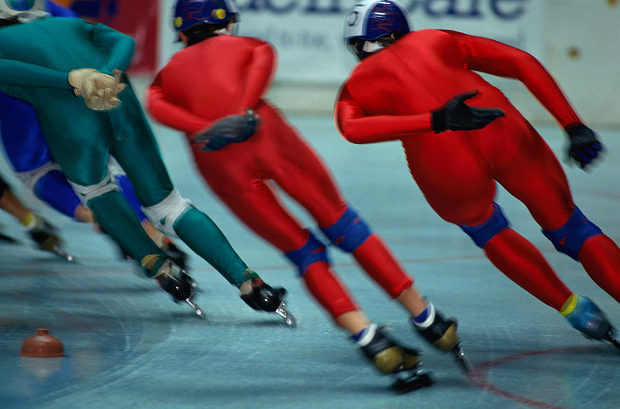 Back View Of Speed Skaters Photograph by Alan Becker