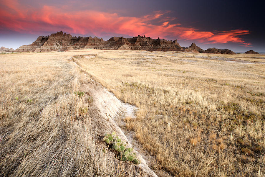 Badlands and Prairie Field at Sunset Photograph by Ericfoltz