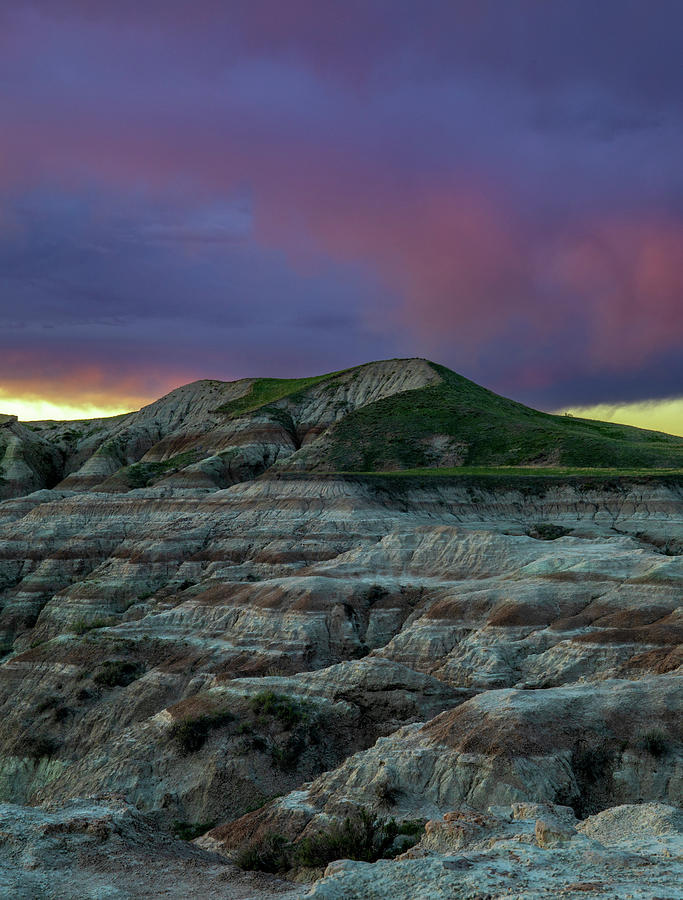 Badlands Stormy Sunset Vertical Photograph by Dan Sproul