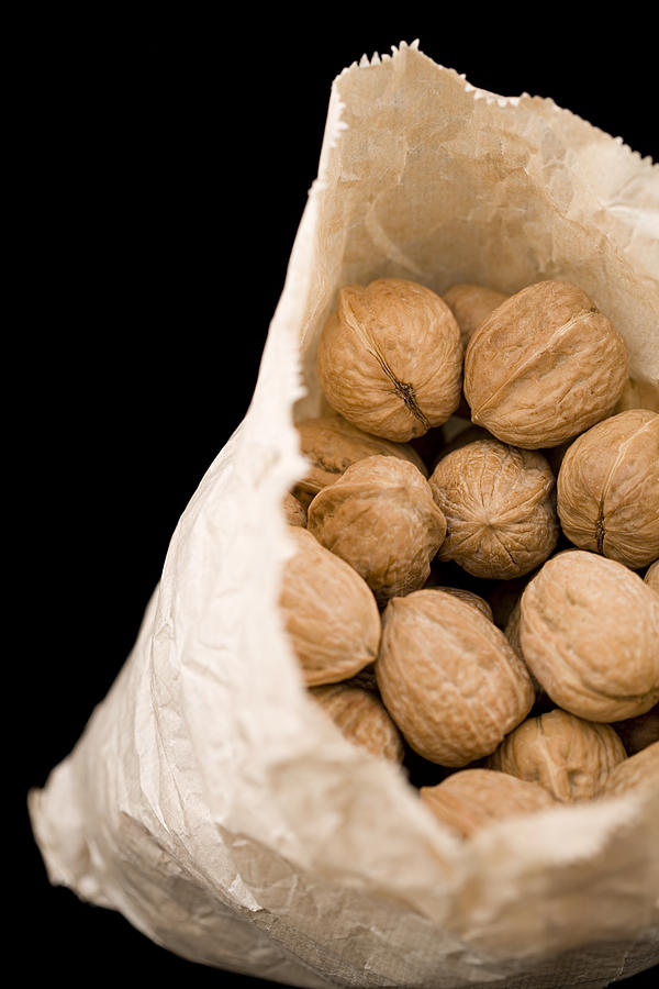 Bag of walnuts Photograph by Image Source