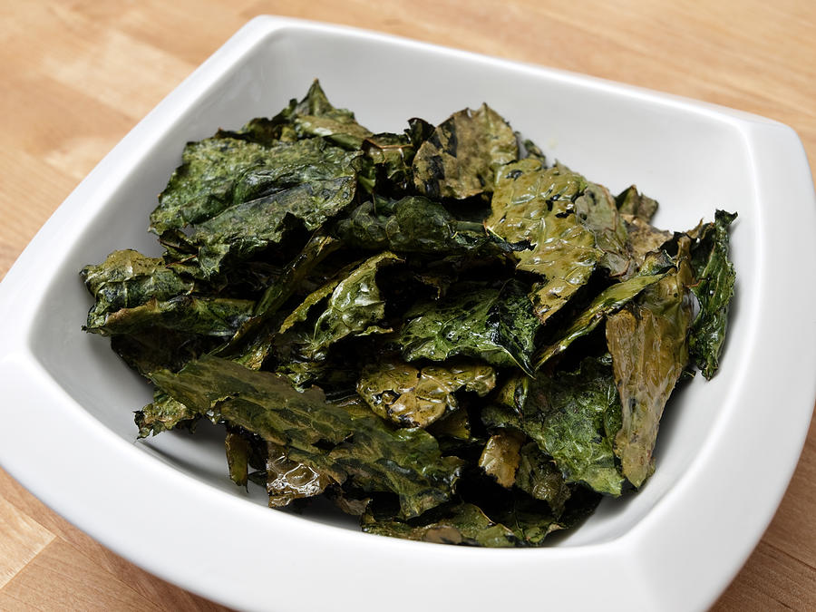 Baked kale chips Photograph by Photography by Paula Thomas