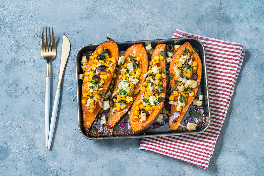 Baked Sweet potatoes with corn tofu  olives Photograph by Carlo A