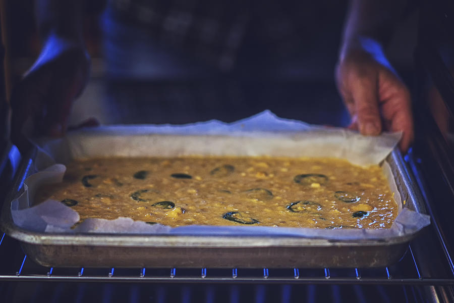 Baking Mexican Corn Bread with Fresh Corn and Jalapenos in the Oven Photograph by GMVozd
