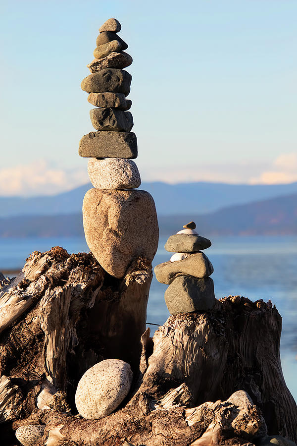 Balance at the Beach - Rock Cairns Photograph by Peggy Collins