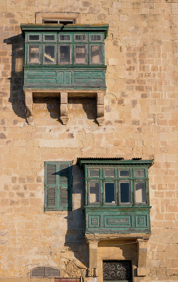 Balconies on a house in Malta. Photograph by Roy Pedersen