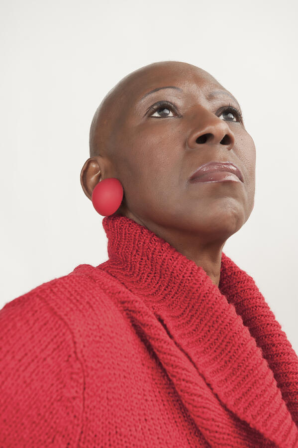 Bald Senior African American Woman Stands Proudly After Chemotherapy Photograph by EyeJoy