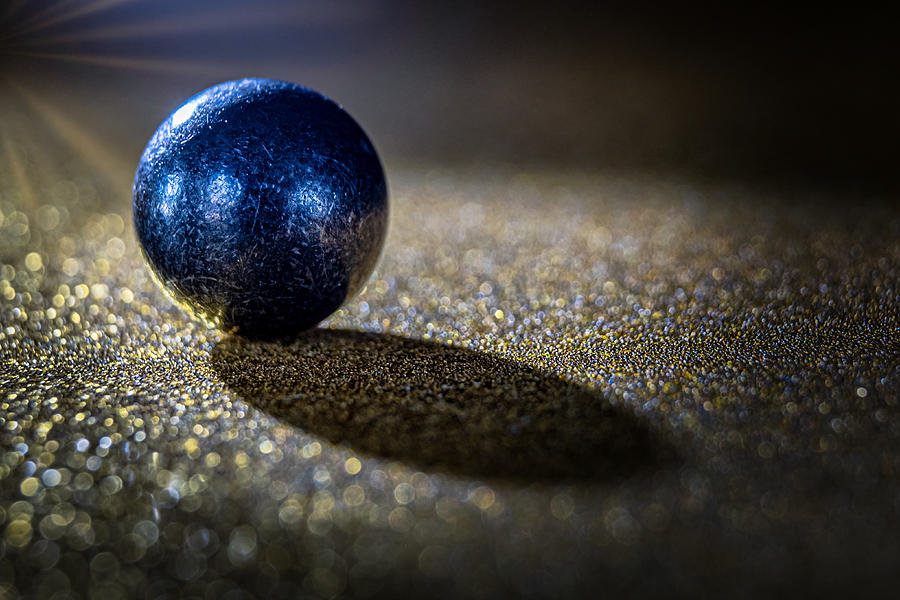 Ball Bearing With Light Beams Photograph by Stuart Litoff