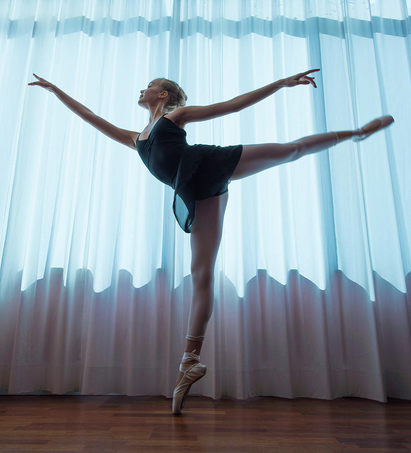 Ballerina Photograph - Ballerina arabesque pose by Steve Williams