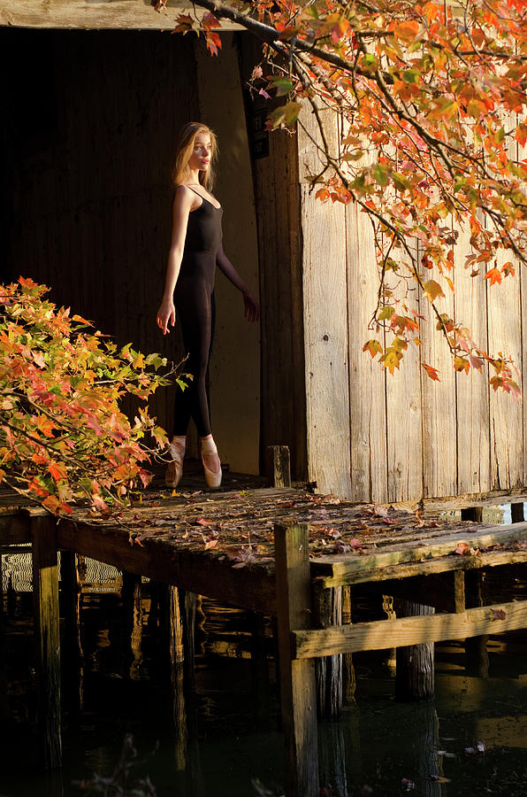 Fall Photograph - Ballerina on pointe outside by Steve Williams