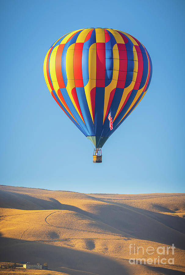 Balloon above the hills Photograph by Inge Johnsson