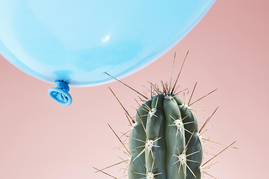 Balloon flying too close to cactus Photograph by Richard Drury