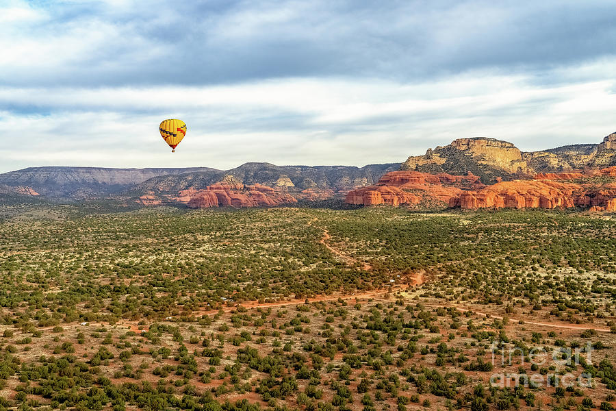 Balloon over Sedona Desert Photograph by Roxie Crouch