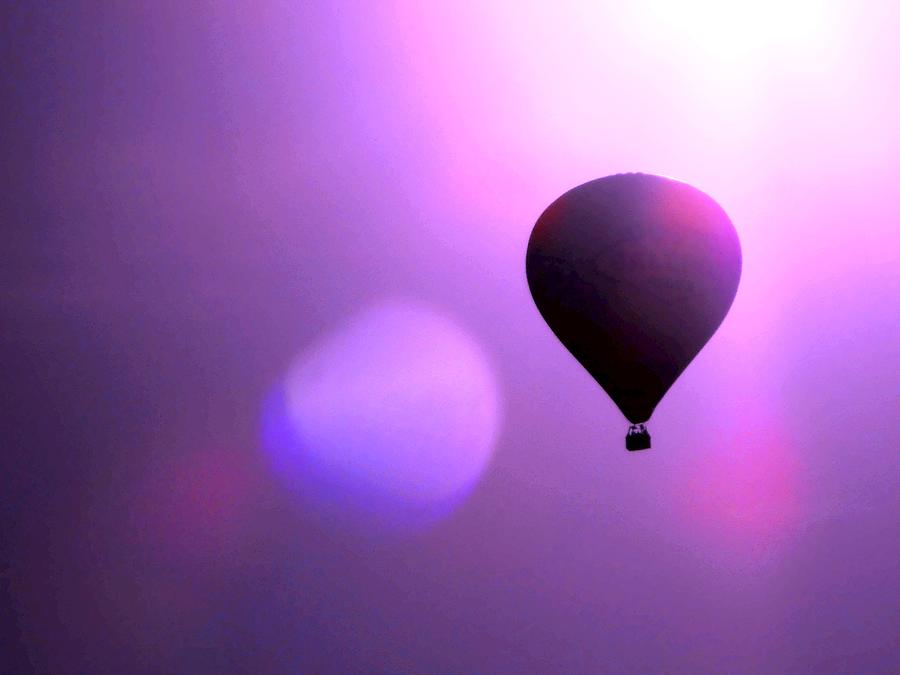Balloon Ride Photograph by Dietmar Scherf