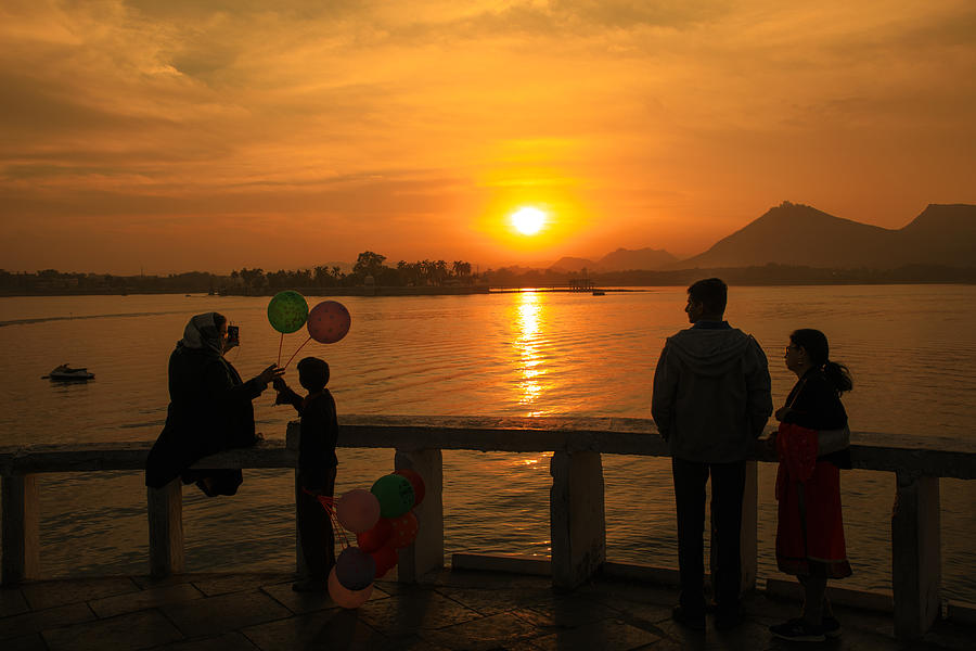 Balloons seller at Fate Sagar Lake Photograph by Dilwar Mandal