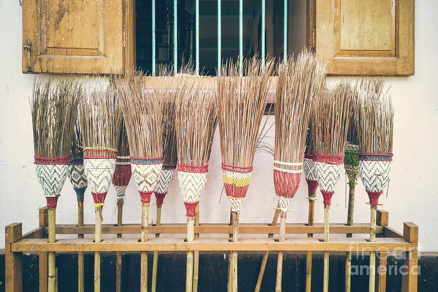 Bamboo brooms Photograph by Delphimages Photo Creations