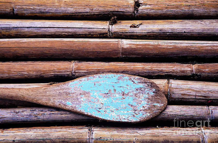 Bamboo Raft And Old Paddle Photograph