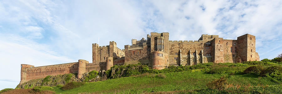 Bamburgh castle panoramic Photograph by Steev Stamford