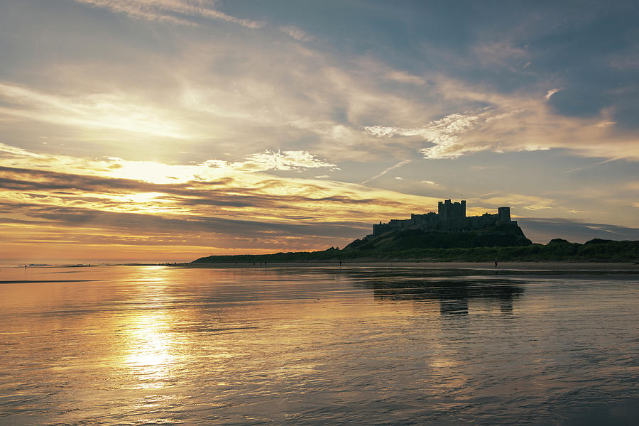 Bamburgh castle reflection Photograph by Steev Stamford