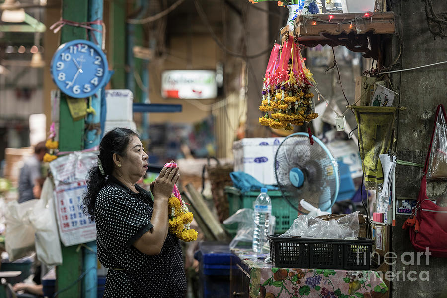 Portrait Photograph - Bangkok Market vendor praying by Tony Camacho