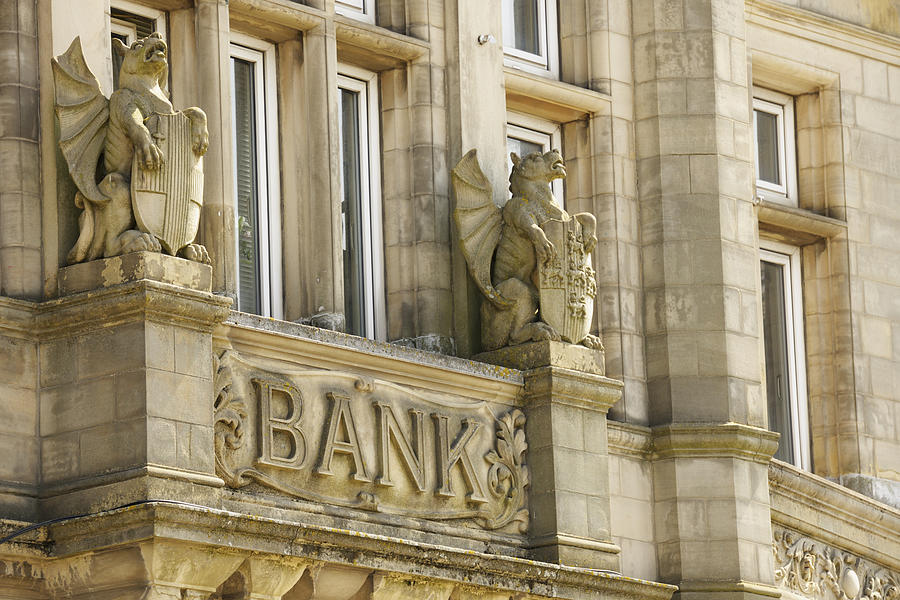 Bank Sign on Old Building Protected by Stone Gryphons Photograph by Ekspansio