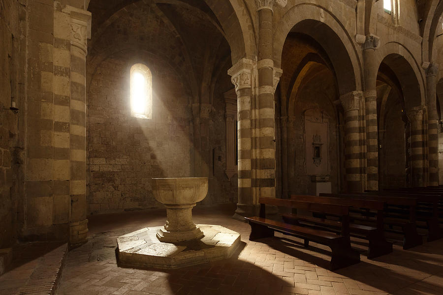 Baptismal font in an ancient cathedral Photograph by Peter Zelei Images