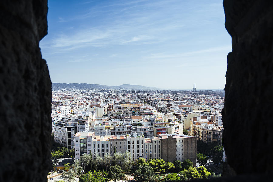 Barcelona city skyline, as seen from Basilica of the Sagrada Familia Photograph by Naomi Rahim