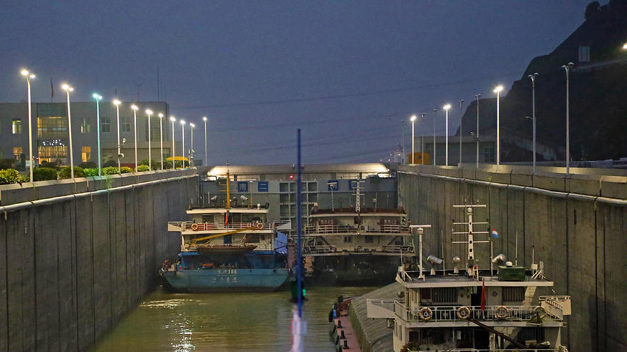 Barges in Three Gorges Dam locks at night Photograph by Elizabeth Beard