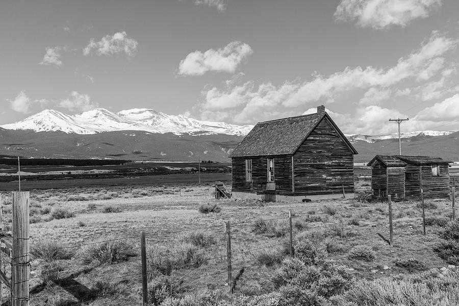 Barn and Mountains in Colorado Photograph by John McGraw