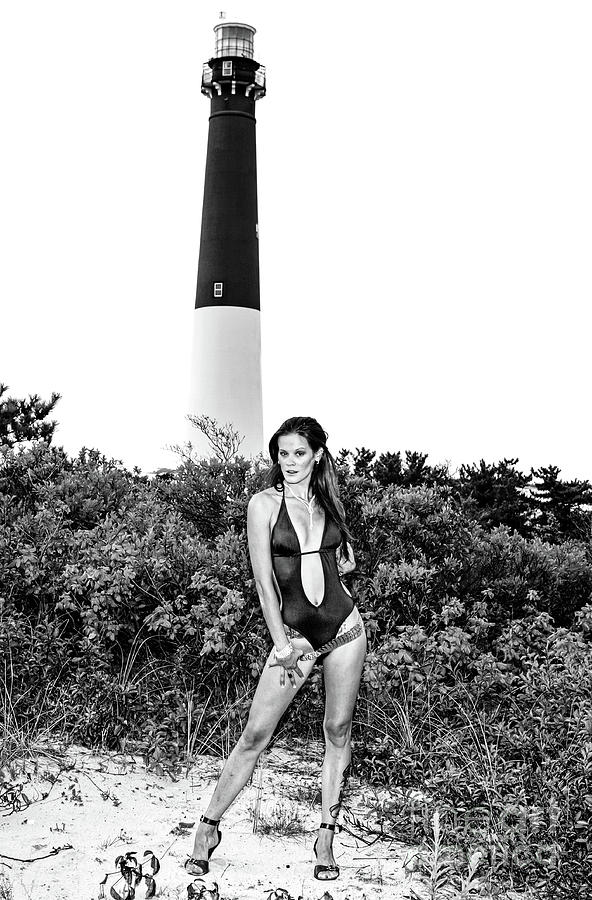 Barnegat Lighthouse Rising Photograph by John Rizzuto