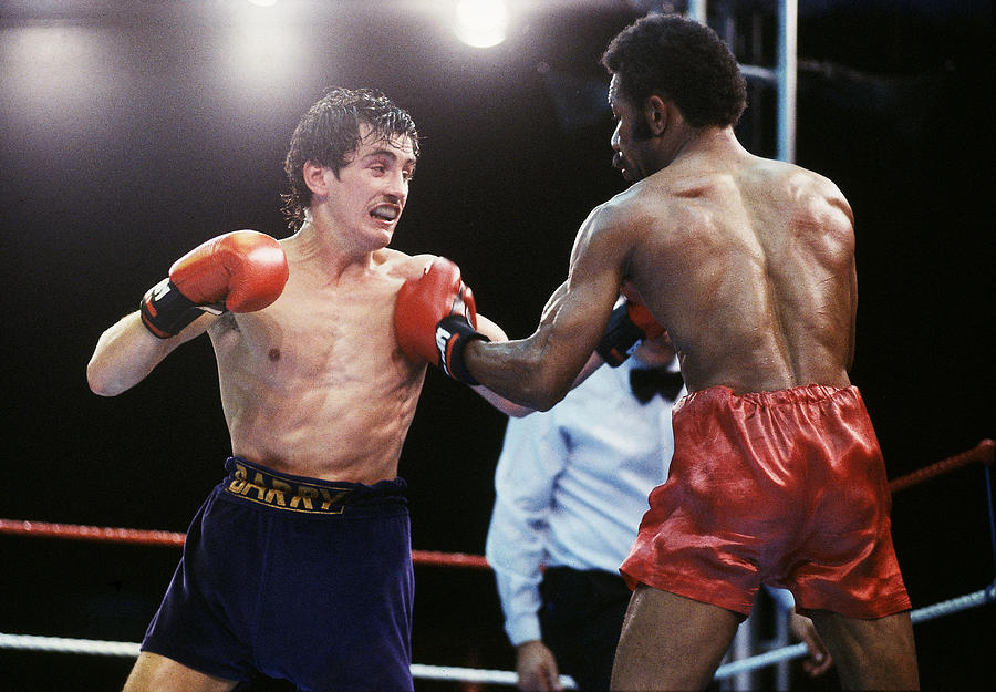 Barry McGuigan of Northern Ireland in action against WBA Champion Eusebio Pedroza of Panama Photograph by Steve Powell