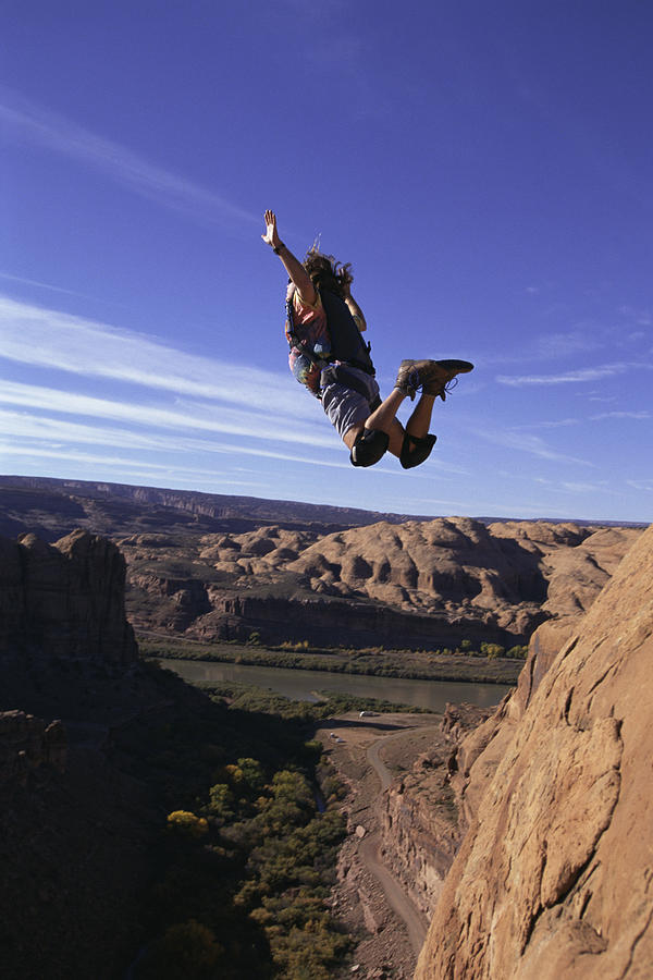 Base jumper in midair Photograph by William R. Sallaz