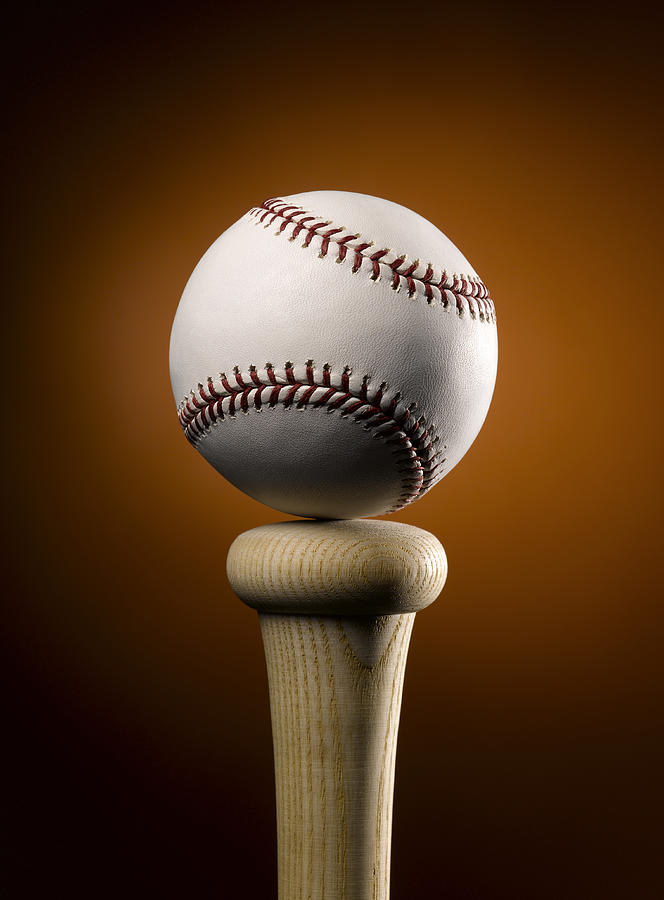Baseball balancing on top of bat, close-up Photograph by Jeffrey Coolidge