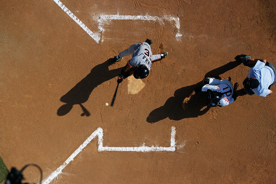 Baseball batter and catcher (overhead view) Photograph by Mike Powell