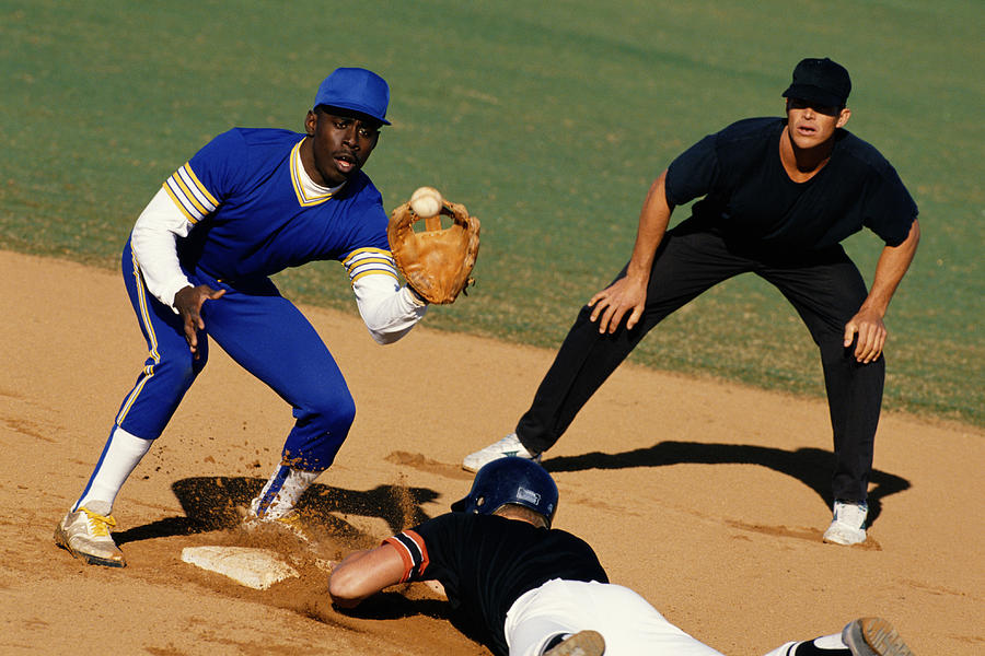 Baseball Player Sliding Into Base Photograph by Yellow Dog Productions