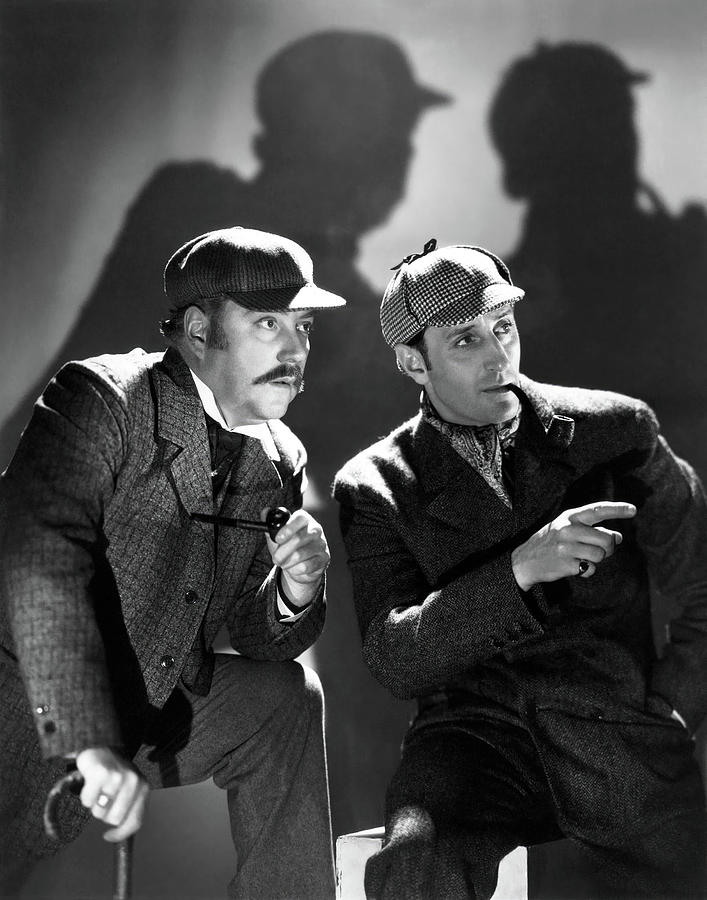 Sherlock Holmes Photograph - BASIL RATHBONE and NIGEL BRUCE in THE HOUND OF THE BASKERVILLES -1939-, directed by SIDNEY LANFIELD. by Album