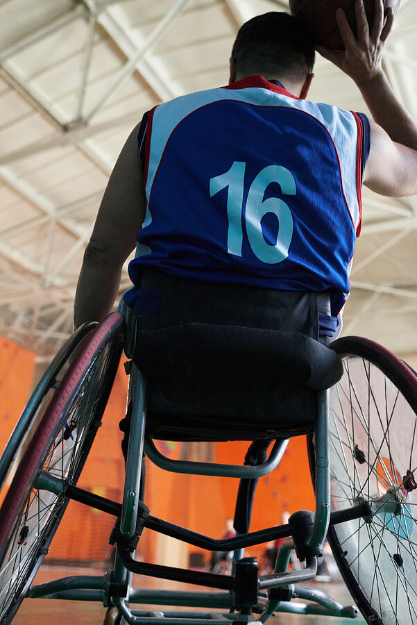 Basketball player in wheelchair Photograph by CliqueImages