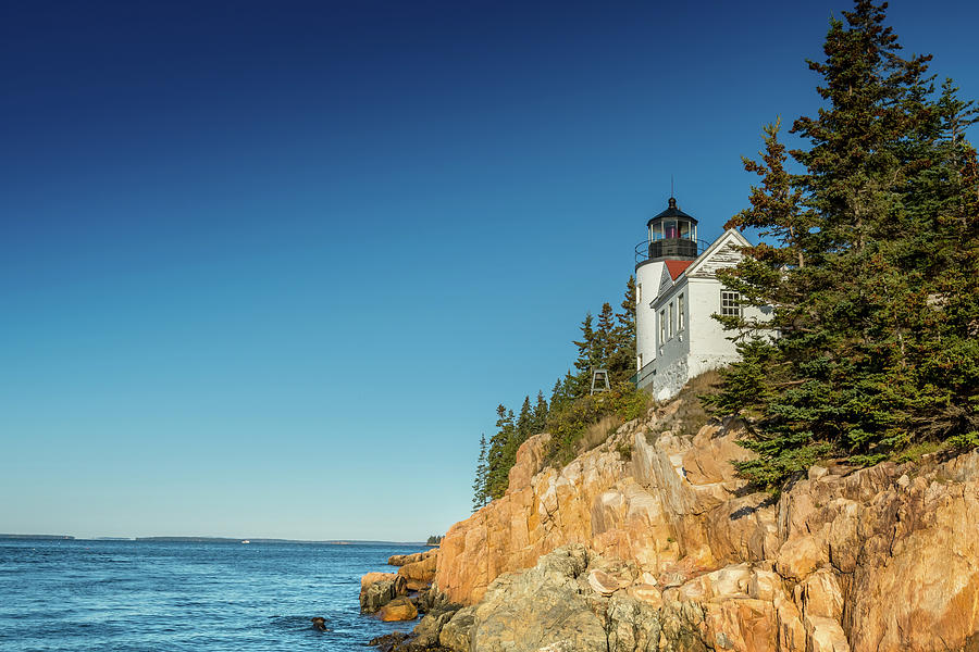 Bass Harbor Lighthouse and Blue Sky Copy Space Photograph by Kelly VanDellen