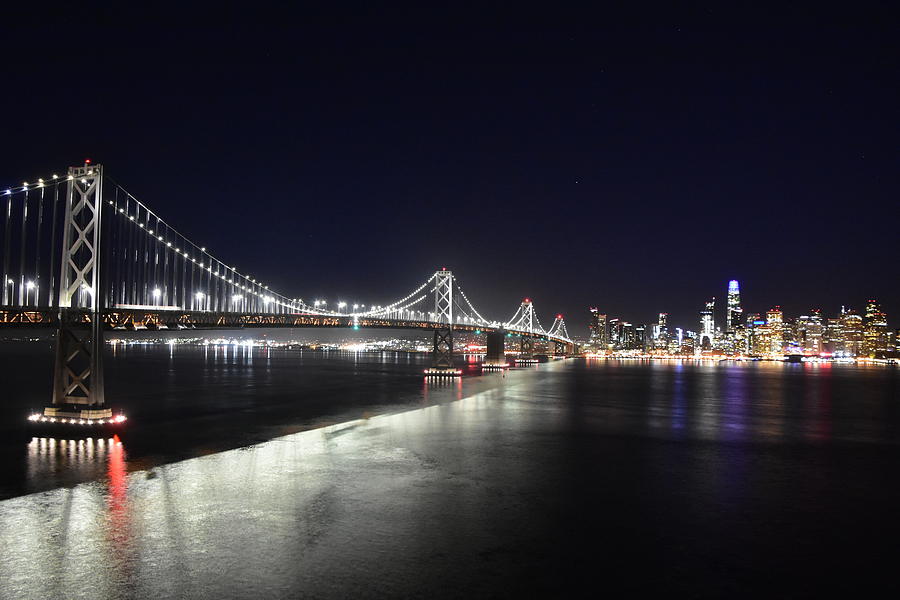 Bay Bridge at night Photograph by Ed Stokes
