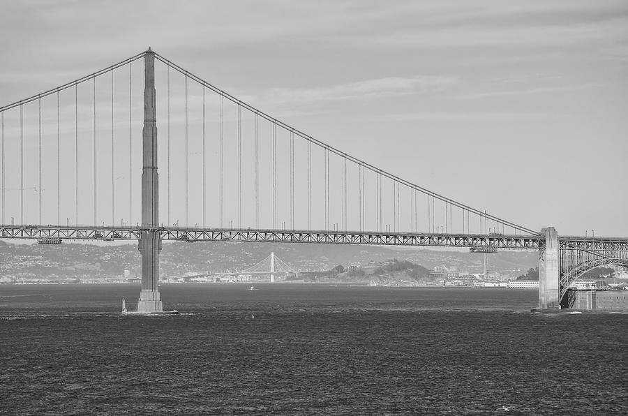 Bay Bridge Under Golden Gate Bridge San Francisco Black and White Photograph by Shawn OBrien