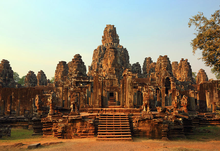 Bayon Temple at sunset in Cambodia Photograph by Mikhail Kokhanchikov