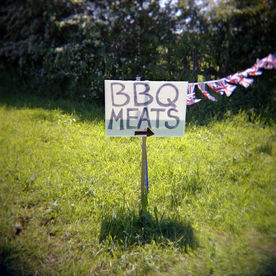 BBQ MEATS sign with Union Jack flags Photograph by James Arnold
