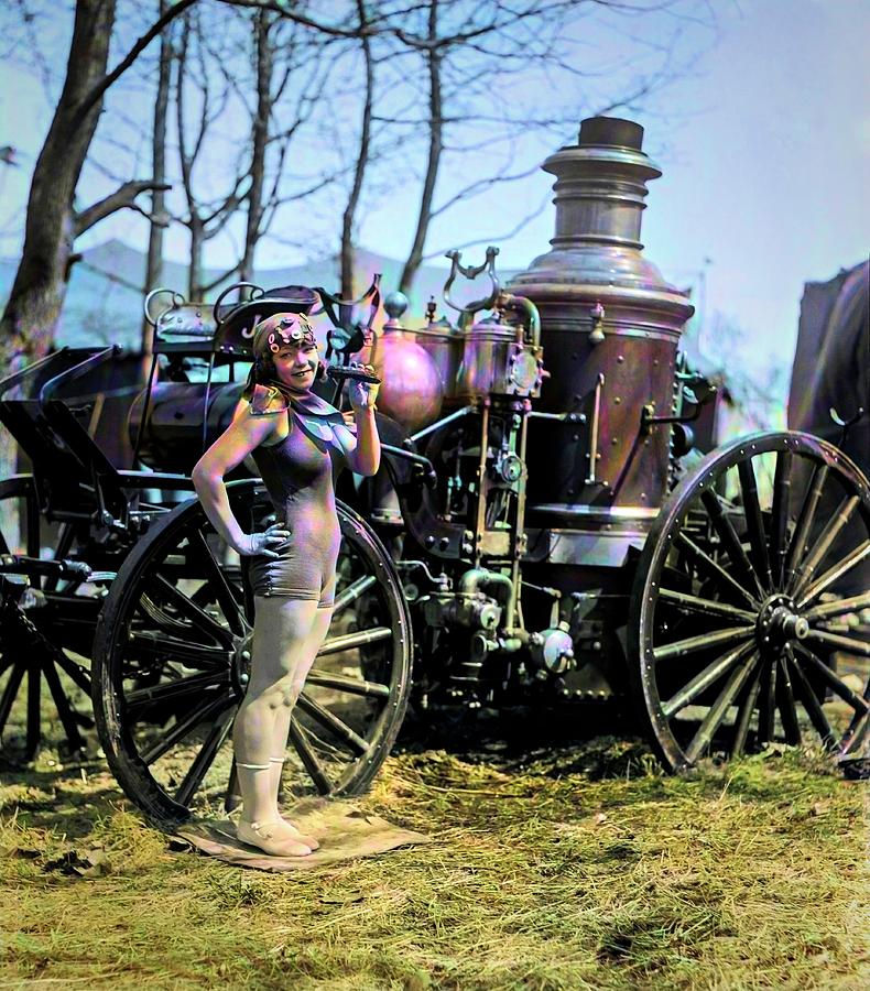 Bea Kyle Standing in front of a 1924  Fire Engine Photograph by Herbert A French