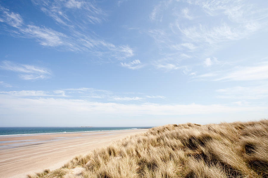 Beach at Bamburgh, Northumberland, UK Photograph by Image Source