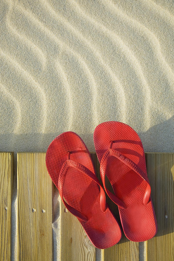 Beach Boardwalk and Red Shoes Photograph by Alex Bramwell