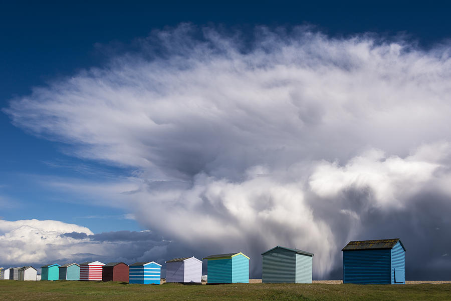 Beach huts and Storm katie. Photograph by John Finney Photography