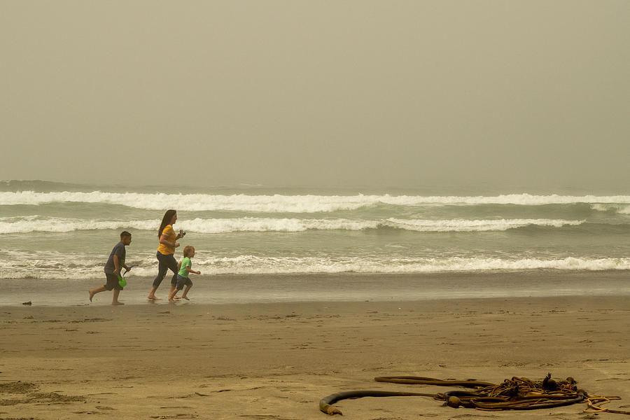 Beach Runners Photograph by Frank Wilson